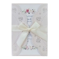 Detail of laser-cut rose hollow invitation card with pearlescent pink finish and ribbon bow - Flesh Pink