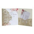 Close-up of laser cut golden glitter wedding invitation with floral insert card set - Light Gold Glitter