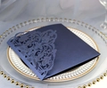 Detail of laser-cut navy blue lace wedding invitation with pearlized finish and floral patterns - Deep Blue