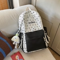 Black and white star patterned school backpack with plush cloud charm and RKDBAG patch - Black with Pendant