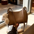 Brown vintage faux leather underarm bag with cute plush animal charm and gold hardware - Brown with Pendant