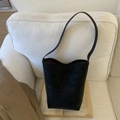 Matte black leather bucket shoulder bag with fine strap and brown interior lining - Black without Pendant