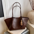 Vintage dark brown large capacity tote bag with long shoulder straps and tassel charm - With Charm / Brown