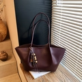 Dark coffee leather tote bag with vintage wooden bead charm in a minimalist style - With Charm / Fuschia