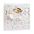 Elegant ivory laser-cut wedding invitation card with floral patterns and satin bow - White
