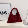 Minimalist deep red frosted tote bag with a unique knot handle and triangular silhouette - Red