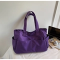 Purple plaid tote bag with multiple exterior pockets and long shoulder straps - Purple