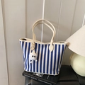 Blue and white striped canvas tote bag with cream handles and fluffy monster charm - Blue with Charm