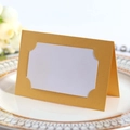 Elegant gold hollow laser cut wedding place card on a luxury dinner plate with white rose - Gold
