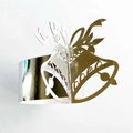 Polished gold Christmas bell napkin ring with festive laser-cut metal ribbon design - Reflective Silver