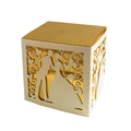 Detail of laser-cut wedding favor box with bride and groom silhouette and gold liner - Ivory and Gold