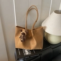 Minimalist faux suede tote bag in earth tones featuring a cute knit bear charm decoration - Brown with Pendant