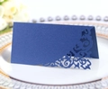 Laser cut navy blue wedding place card with pearlescent finish on an elegant gold rimmed plate - Sapphire Blue