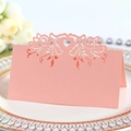 Elegant laser cut heart place cards in soft pink pearl paper for wedding table setting - Pink