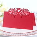 Elegant red laser-cut wedding place card with intricate rose and heart pattern - Pearlescent Red