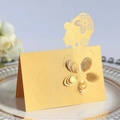 Golden wedding place card with laser cut girl silhouette and 3D flower detail - Gold