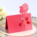 Elegant red glitter laser-cut place card with 3D paper flower for wedding table decor - Pearlescent Red