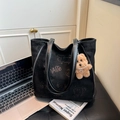 Black suede tote bag with pink graffiti art, dual straps, and cute brown bear pendant - Black