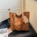 Brown suede tote bag with cartoon illustrations and plush bear charm for daily use - Brown
