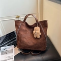 Dark brown faux suede multi-way tote bag with unique embossed graffiti and plush charm - Brown