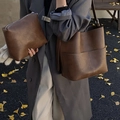 Deep brown leather bucket tote bag and small zipper pouch with retro pebbled texture - Brown