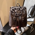 Vintage Leder Rucksack in Braun mit Leopardenfell-Klappe und Kordelzugverschluss - Braun