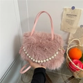 Pink plush crossbody bag with white pearl chain handle and golden hardware accessories - Pink