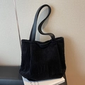 Bolso tote grande de pana negra para mujer con correas de cuero y etiqueta discreta - Negro
