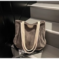 Bolso tote de pana gris oscuro con correas blanco roto y etiqueta de marca en cuero - Gris