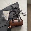 Brown leather Boston barrel bag with top handles and adjustable shoulder strap - Brown No Pendant