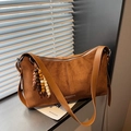 Brown suede crossbody bag with adjustable strap and wooden bead tassel detail - Brown with Pendant