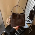 Vintage dark brown frosted bucket bag with a teddy bear charm and contrast stitching - Coffee with Pendant