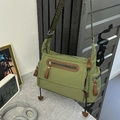 Grass green nylon messenger bag with adjustable wide strap and brown leather accents - Army Green