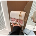 Pink woven crossbody bag with cream flap and gold chain strap featuring ball buckle - Pink with Pendant