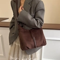 Coffee brown suede tote bag featuring a minimalist design and long zipper tassel detail - Brown