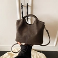 Dark brown matte bucket bag with contrast stitching and golden hardware in crossbody style - Coffee No Charm