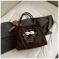 Brown tote bag with cartoon cat patch, plush bear charm, and striped ribbon detail - Coffee with Pendant