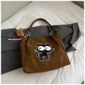 Brown nylon tote bag featuring black cartoon cat embroidery and a small plush bear pendant - Brown with Pendant