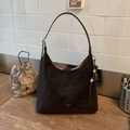 Retro black matte leather shoulder bag with a vintage charm and tassel detail - Brown