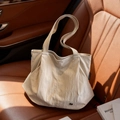 Chic beige nylon tote bag with pleated texture on leather seat for commuting - Off White