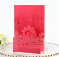 Detailed laser-cut 3D wedding invitation featuring a red castle and carriage design - Pearlescent Red