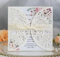 Detailed laser-cut butterfly wedding invitation with cream ribbon and floral card insert - Ivory