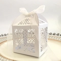 Elegant laser-cut pearl white candy gift box with sheer ribbon on a ceramic tray - White