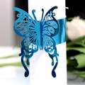 Laser-cut butterfly napkin ring in metallic blue finish for elegant wedding table decor - Reflective Blue