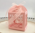 Pink laser-cut candy gift box with heart hollow patterns and a delicate organza ribbon bow - Pink
