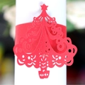 Red laser-cut Christmas tree paper napkin ring with intricate hollow star patterns - Pearlescent Red