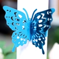 3D laser-cut butterfly napkin ring in metallic blue with elegant hollow wing texture - Reflective Blue