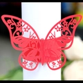 Elegant red laser-cut butterfly paper napkin ring with intricate floral hollow design - Pearlescent Red