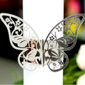 Elegant silver laser-cut butterfly napkin ring with intricate hollowed floral patterns - Reflective Silver