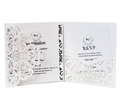 Elegant laser-cut ivory wedding invitation set with intricate lace pattern and RSVP card - White